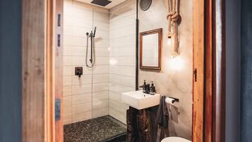 Bathtub, hair dryer, towels