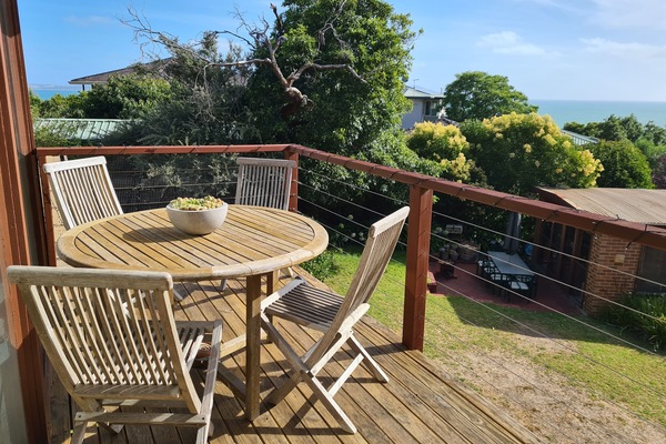 Enjoy a drink or meal on the balcony.