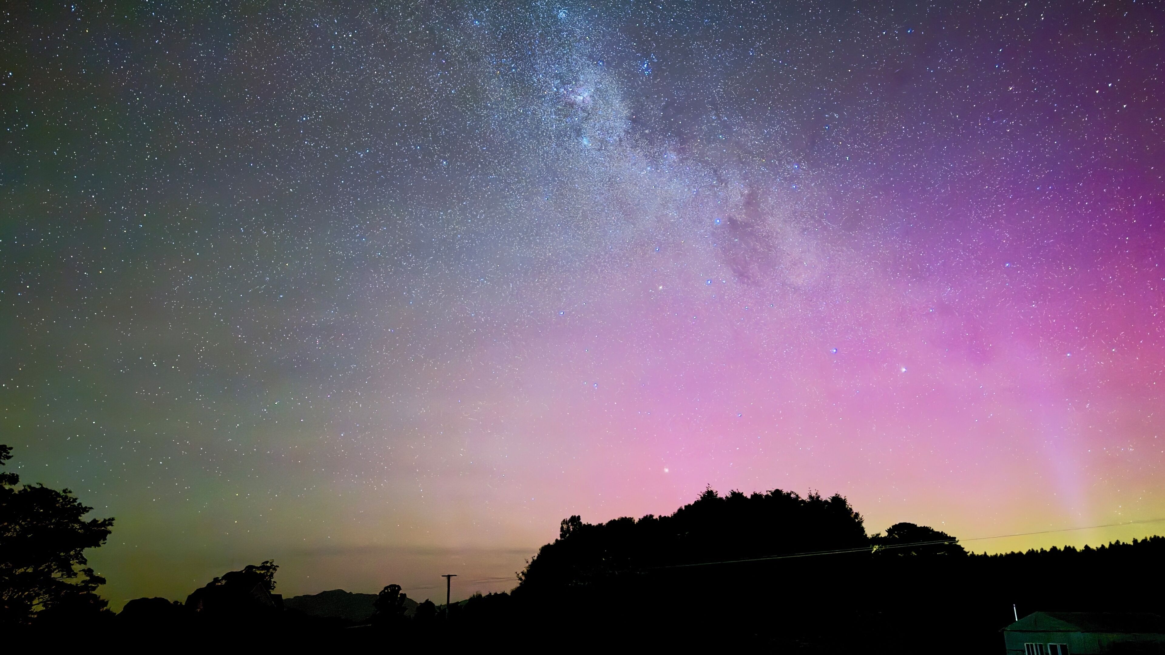 A night sky with stars and the Milky Way.