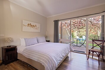 King size bed with premium quality linen and private garden outlook