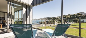 Bo på bukta - Penthouse på Evans Bay