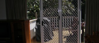 Family-friendly. Pet-friendly. 50m to water. Air con. WiFi. Parking. BBQ deck