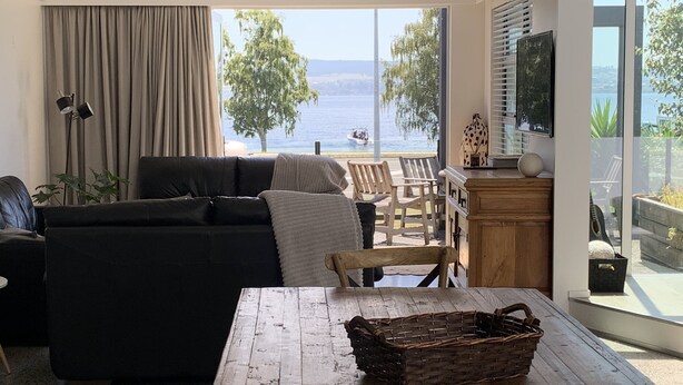 Living area - Relax, unwind and enjoy the views from this unbeatable lakeside location. (Two Mile Bay (2 Mile Bay))