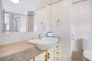 Shower, hair dryer, shampoo