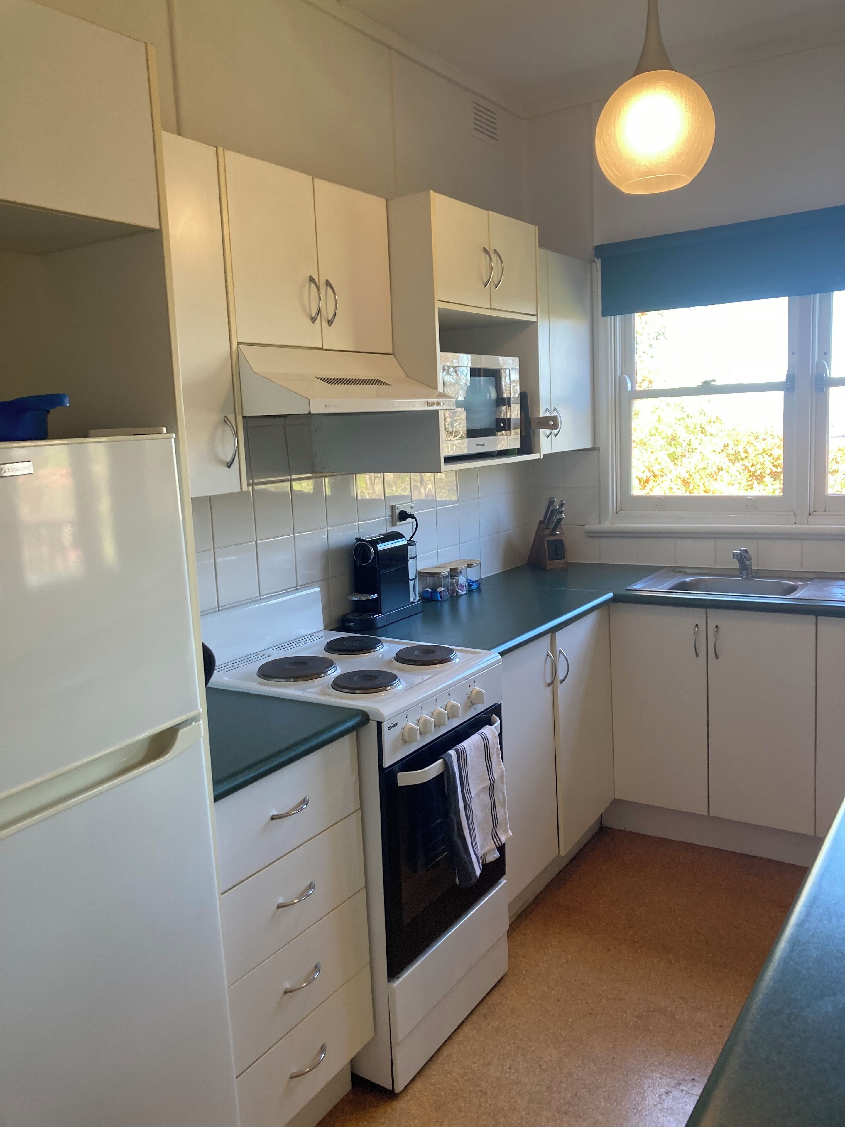 Coffee/tea maker, fridge, microwave, oven