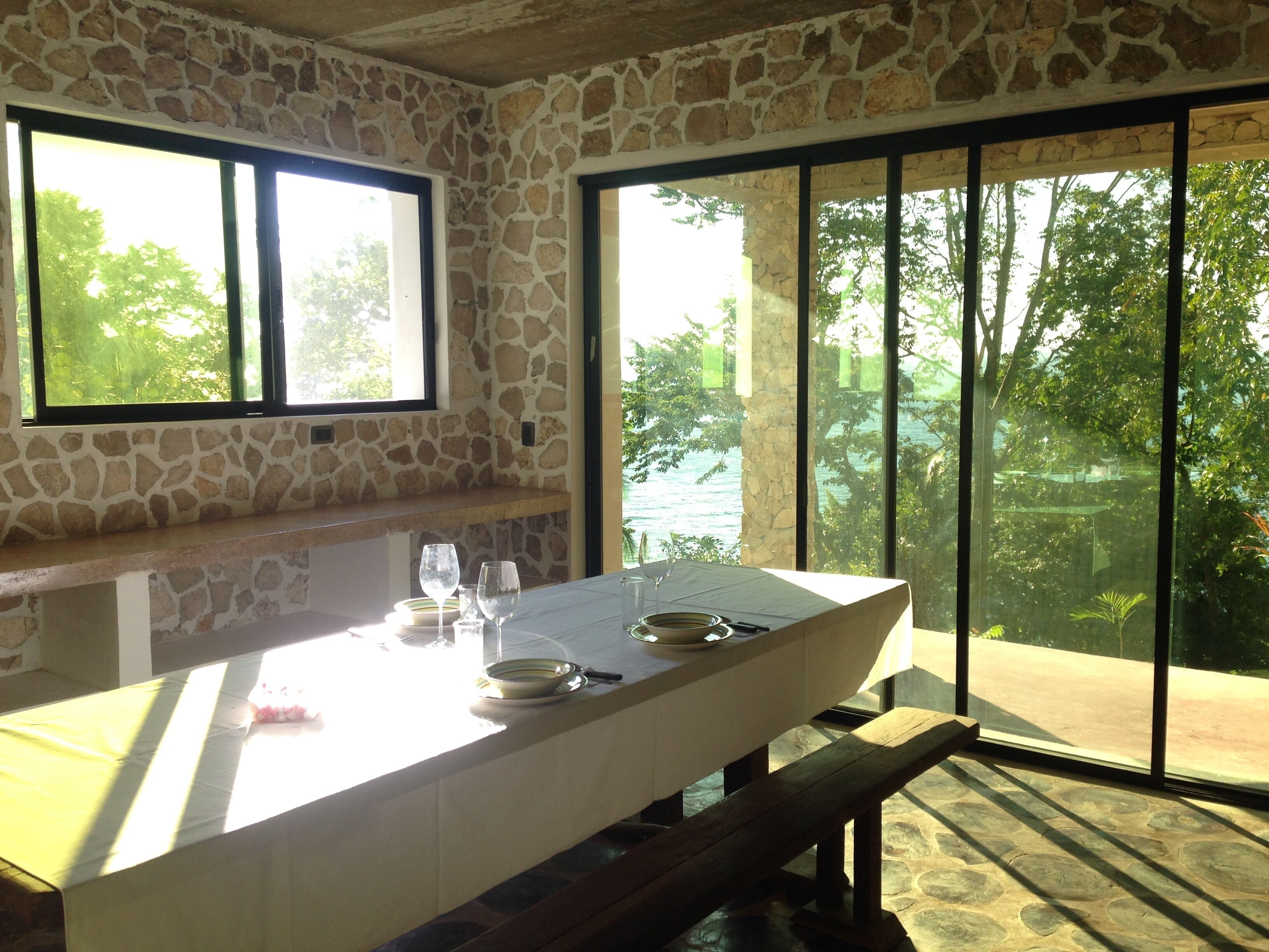 Big dining table with lake views
