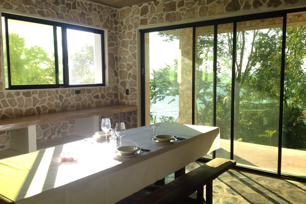 Big dining table with lake views