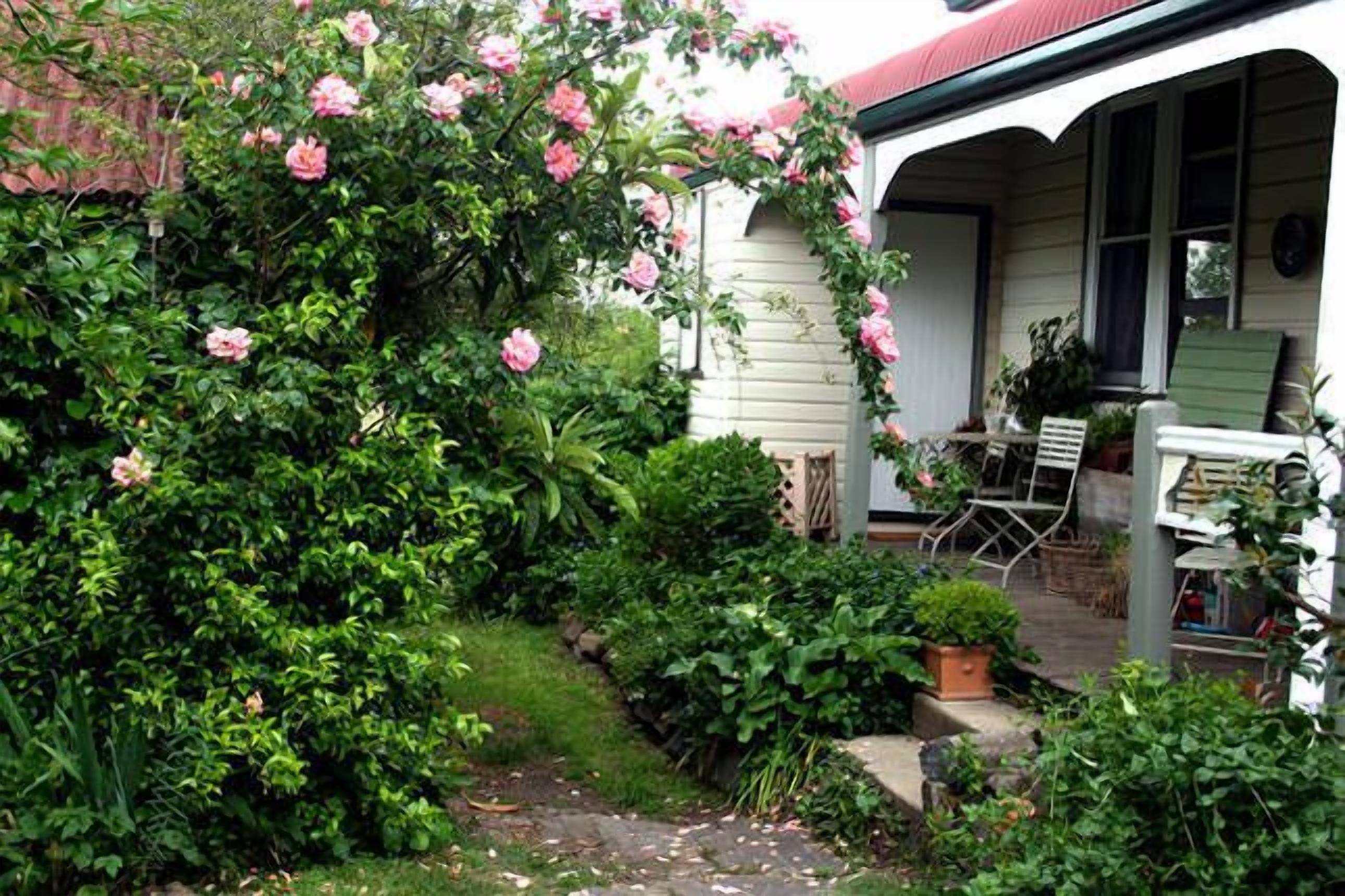 Breakfast may be enjoyed on the side verandah