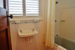 Combined shower/tub, hair dryer, towels, soap