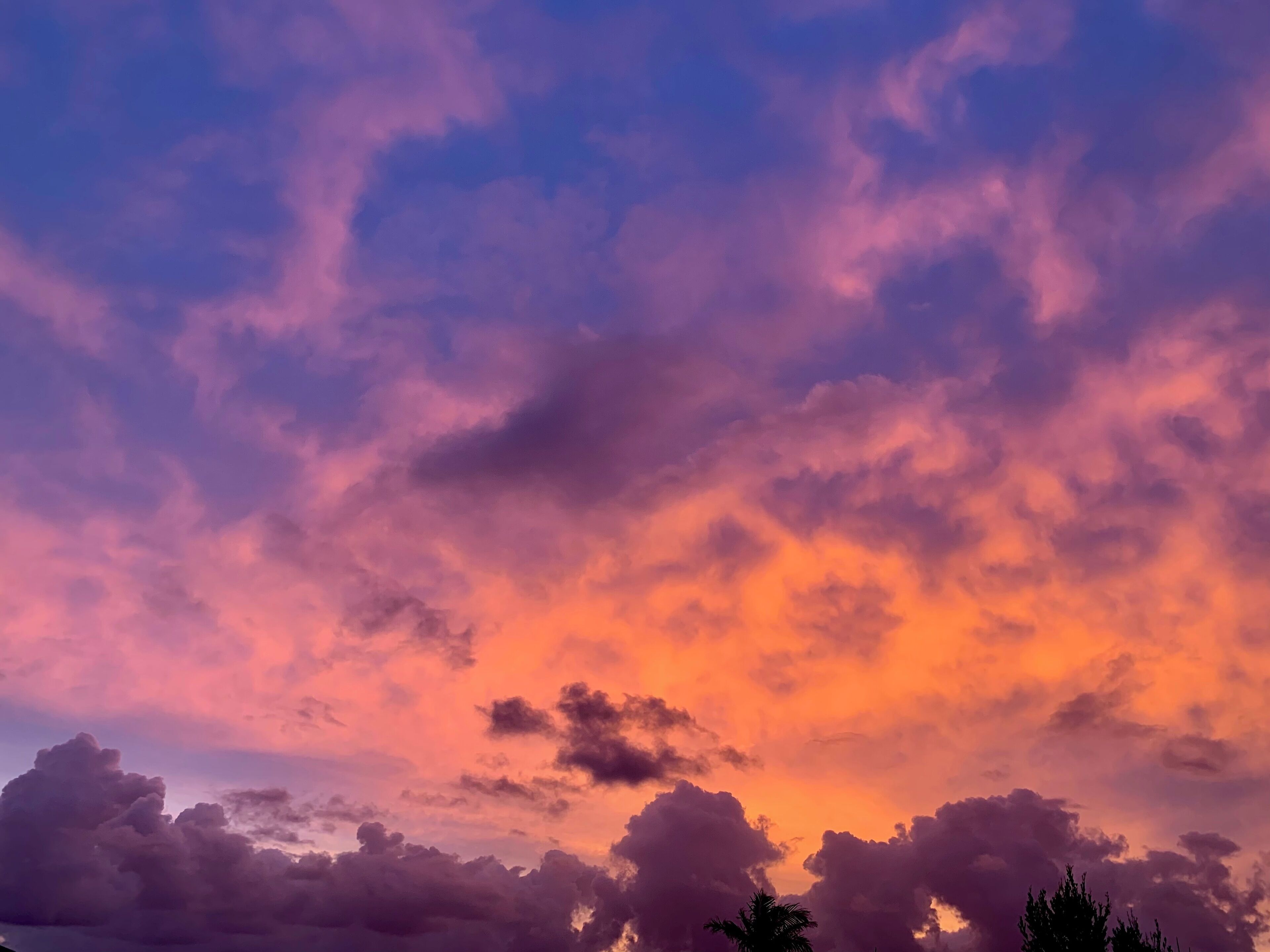 A sunset sky with clouds.
