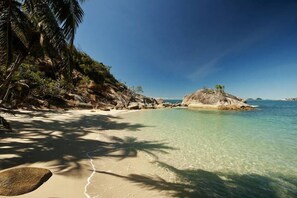 On the beach - Bedarra Beach House 
Free water transfers included with Bedarra Water Transfers (Bedarra Island)
