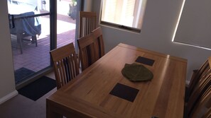 Dining room, looking out to alfresco area.