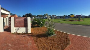 Park and playground across the road.