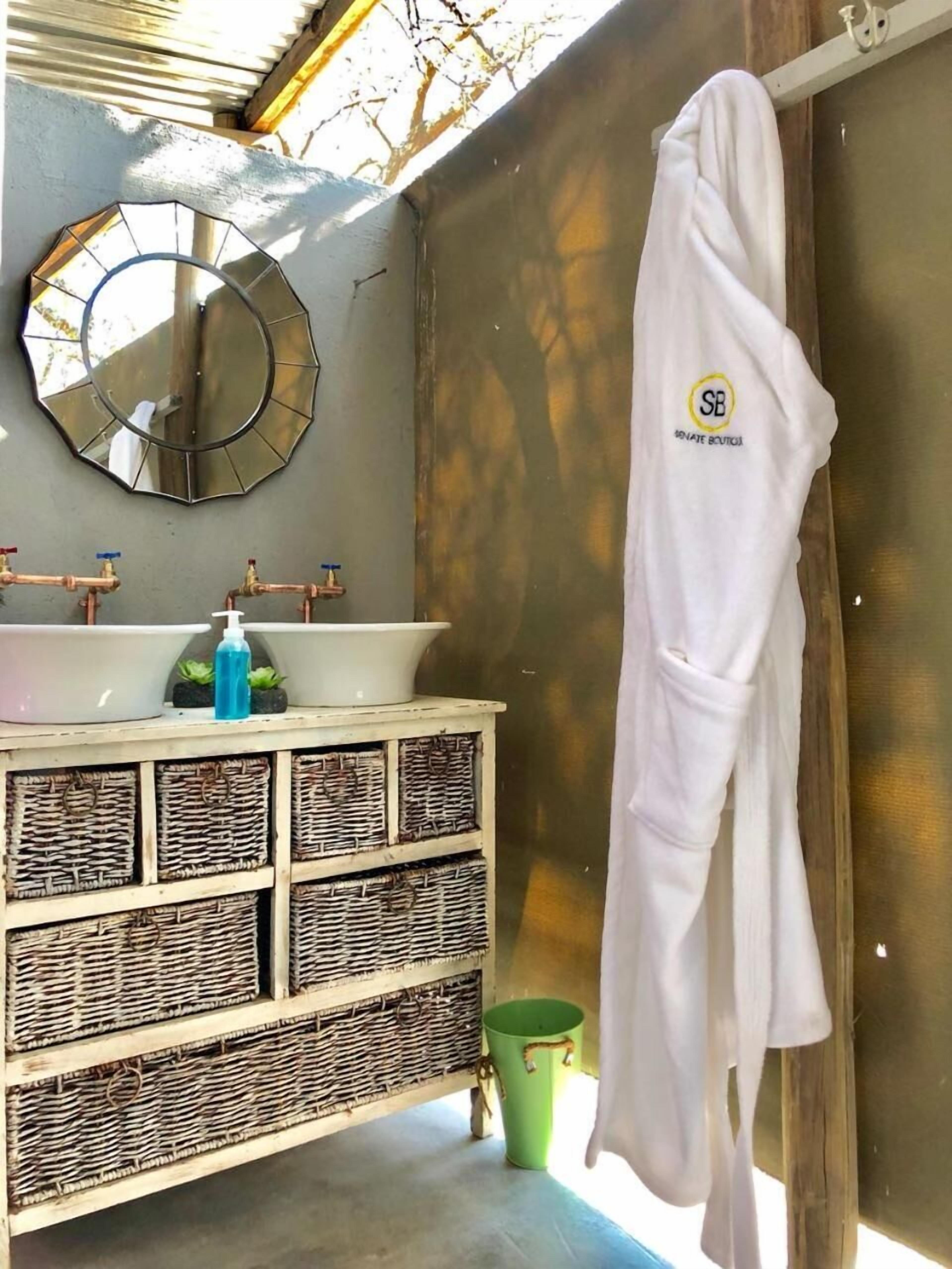 Separate bathtub and shower, rainfall showerhead, free toiletries