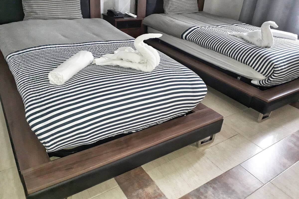 Twin Room | In-room safe, desk, blackout drapes, WiFi (free)