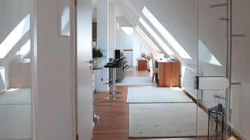 Deluxe Apartment | Living area | Flat-screen TV, DVD player