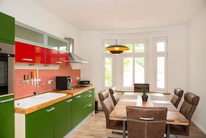 Apartment, 2 Bedrooms | Private kitchen | Fridge, microwave, stovetop, coffee/tea maker