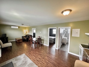 Deluxe Suite, 2 Bedrooms, Non Smoking, Kitchen | Living area - Stay in Gros Morne (Rocky Harbour)