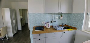 Fridge, microwave, electric kettle, toaster