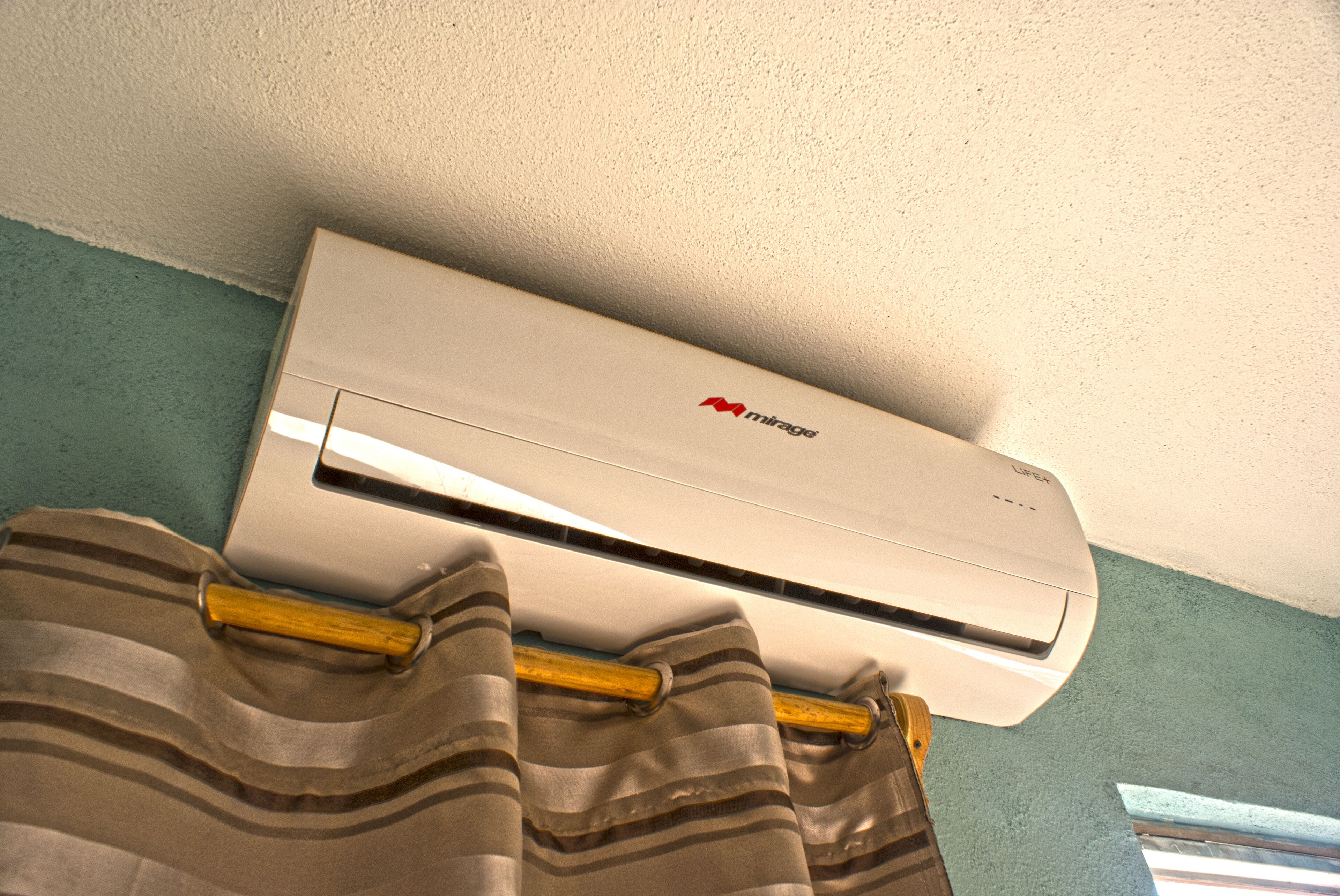 An amazing apartment with green area, garden with teable and chairs in the best 