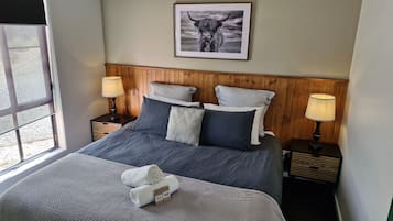 2 habitaciones, tabla de planchar con plancha y cuna de viaje