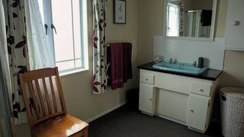 Shower, hair dryer, bathrobes, towels