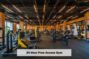 Stay fit on your schedule with 24-hour access to our fully equipped gym featuring weight machines, free weights, and cardio equipment.