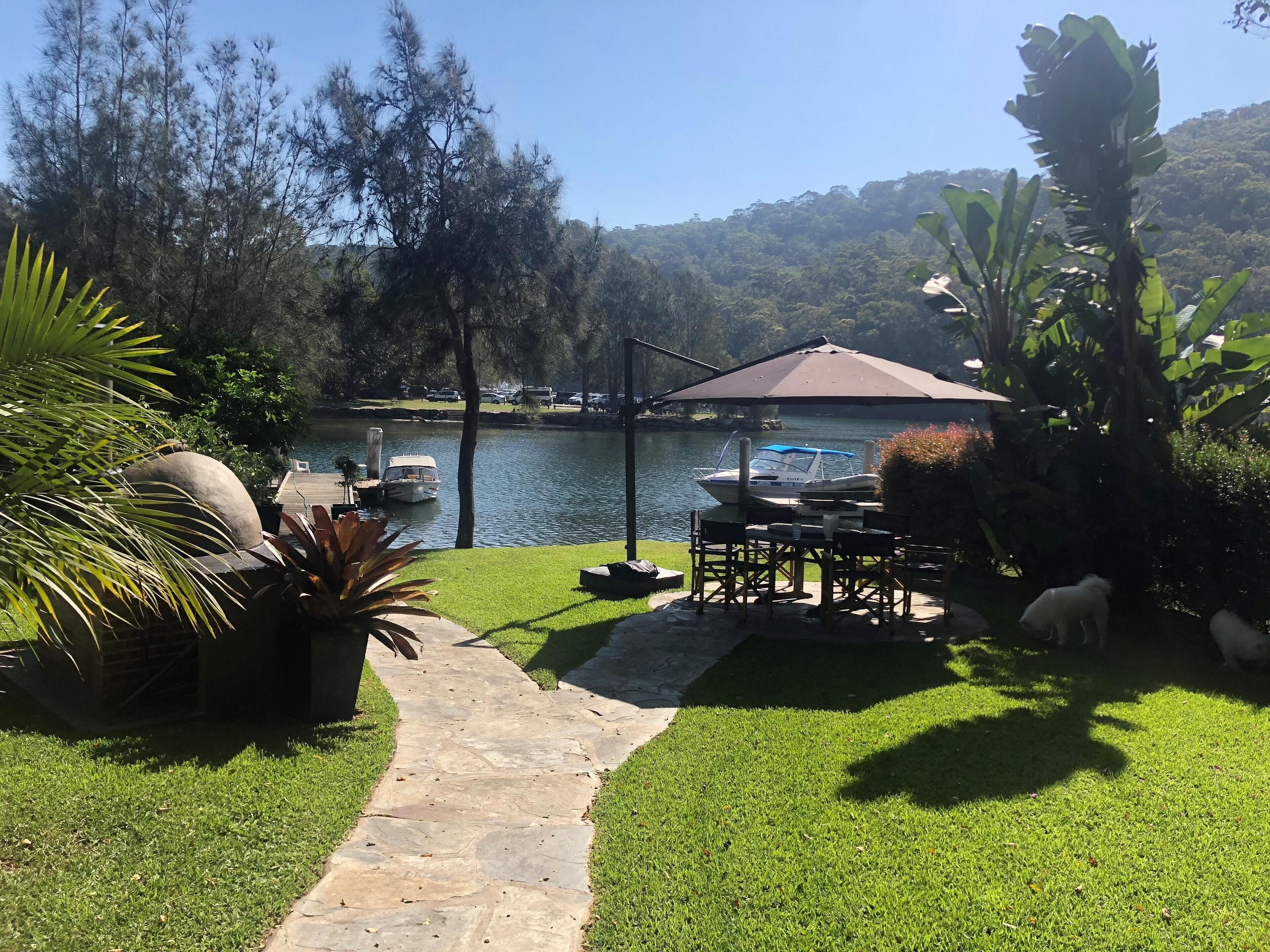 Unique Gorgeous Waterfront property on Pittwater with Jetty and flat back yard