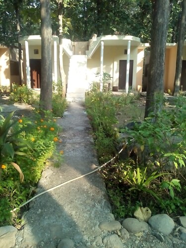 CORBETT TIGER RETREAT [ RIVER SIDE, MUSICAL PRESENCE OF RIVER, WILDLIFE, BIRDS] 