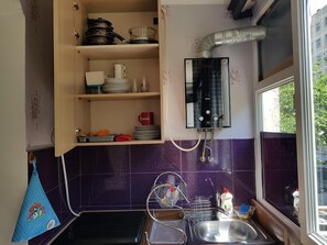 Fridge, stovetop, coffee/tea maker, toaster