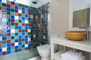 Bathtub, hair dryer, towels, soap