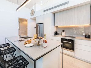 Fridge, microwave, oven, stovetop - Premium Beachside Living at Chic Coogee Escape E8 (Coogee)