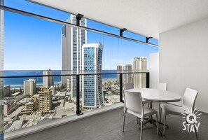 Outdoor dining - Circle on Cavill – 1 Bedroom + Study Ocean — QStay (Surfers Paradise)