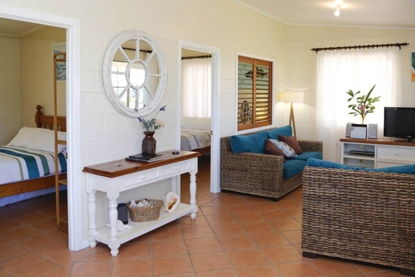 Shalom by the Sea - Living room with 2 queen bedrooms.