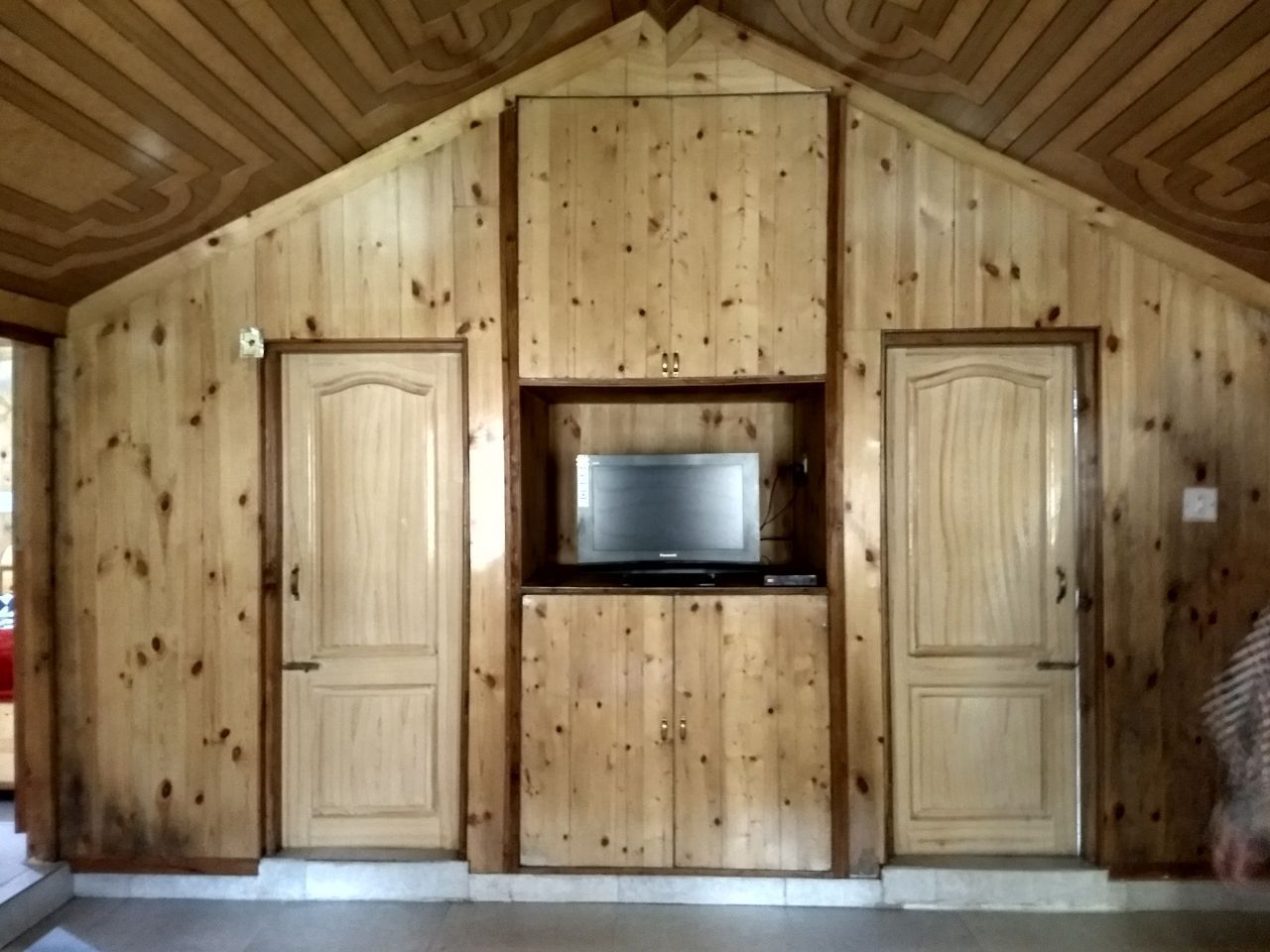 Wooden Cottage in middle of an apple orchard