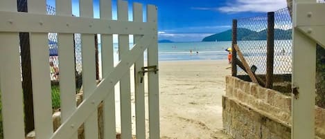 On the beach, sun-loungers