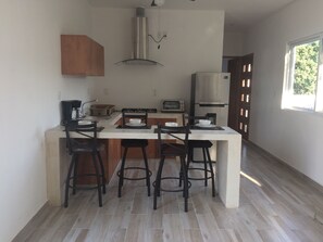 Fridge, microwave, oven, stovetop - Cozy, New minimalist apartament  in a gated comunity, with security 24/7 (Cancún)