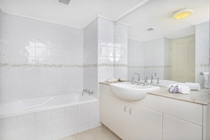 Combined shower/tub, soap