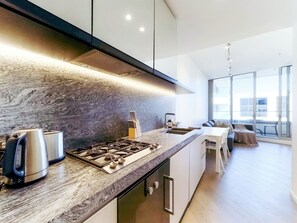Fridge, microwave, oven, stovetop - Fawkner Residence 1B1B Condo with Pool&Gym Access (Melbourne)