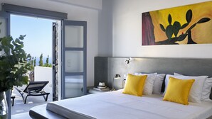 A modern bedroom with a large bed, a nightstand, a lamp, and a painting on the wall. - Kota Villa with private pool (Santorini)
