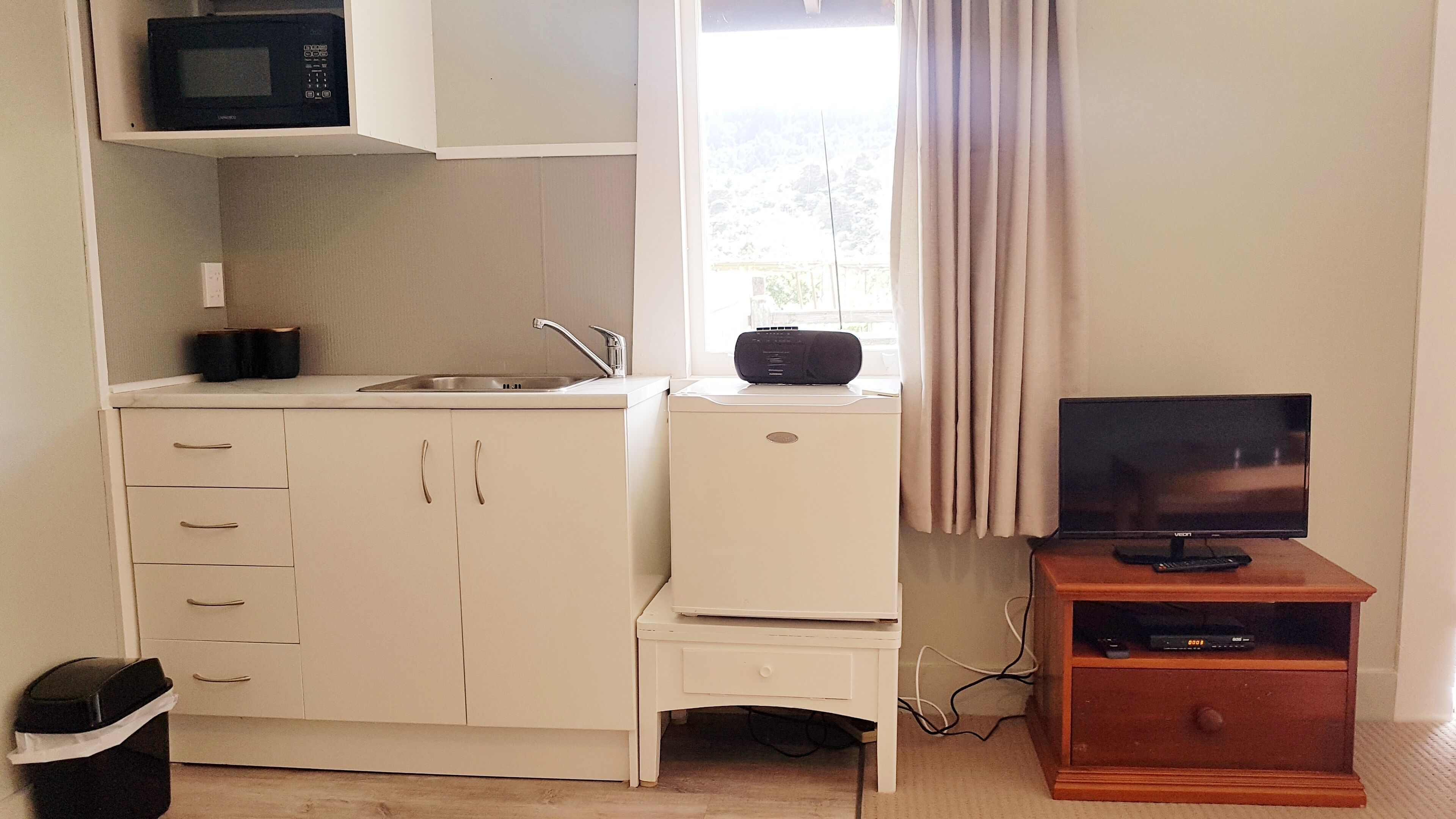 Fridge, microwave, electric kettle, toaster