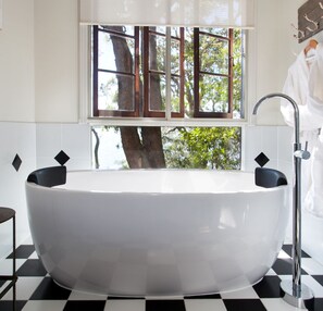 Shower, bathrobes, towels