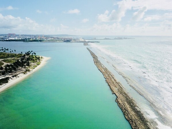 On the beach, sun-loungers