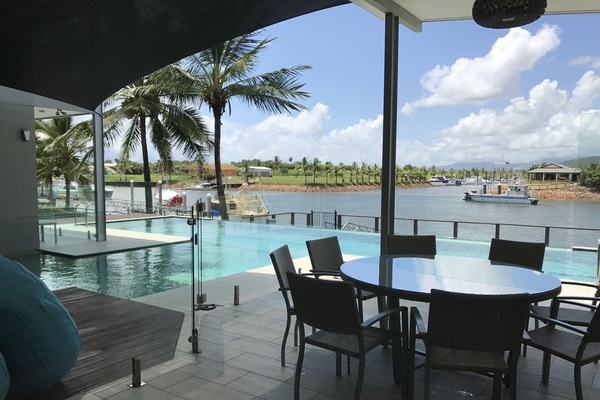 On the poolside deck overlooking Hinchinbrook Harbour