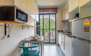 Microwave, stovetop, coffee/tea maker, cookware/dishes/utensils - Please do not book.  I am tring to unlist this property (Tambon Talat Yai)