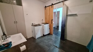 Shower, hair dryer, towels, soap