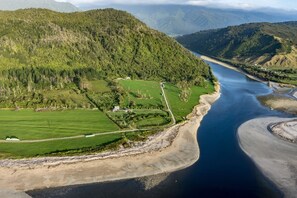 Aerial view - Home with stunning River and Ocean views. Pet-friendly (Mokihinui)