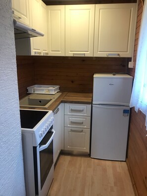 Fridge, coffee/tea maker, toaster, coffee grinder