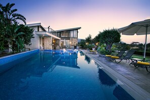 Outdoor pool, pool umbrellas, pool loungers