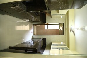 Fridge, microwave, cookware/dishes/utensils, dining tables